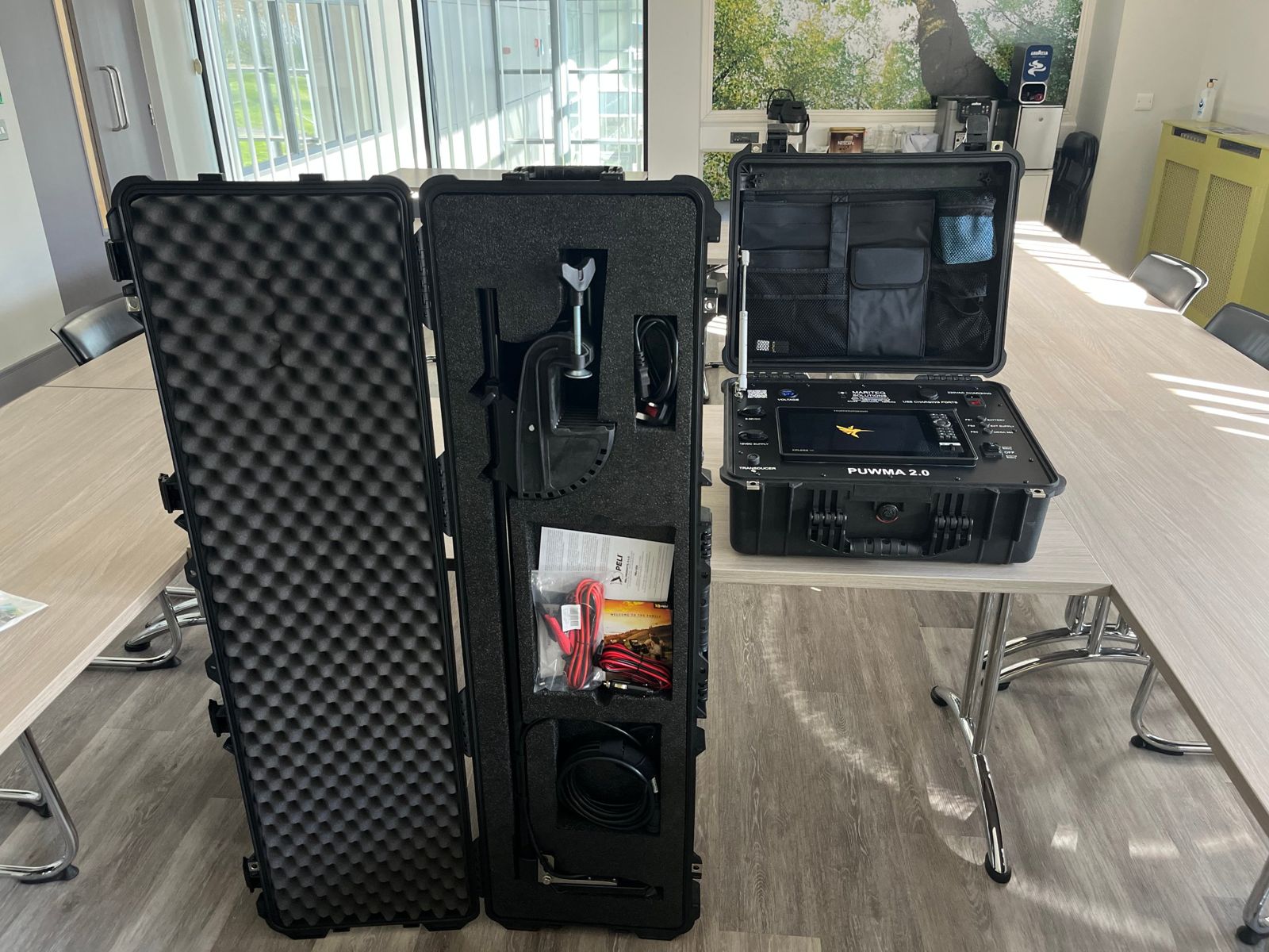 PUWMA 2.0 control case and long transport case open side by side